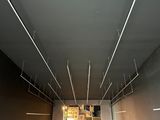 a man that is standing in the middle of a room