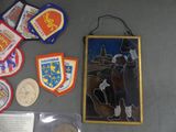 a picture of a collection of badges and other items