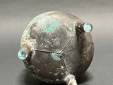 a metal object that is sitting on a table