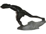 statue of a man on a surfboard on a white background