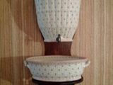 a picture of a wall mounted shelf with two bowls on it