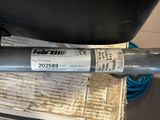 an image of a metal pipe with a sticker on it