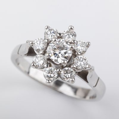 Bague marguerite, diamants taille brillant, central 0.
