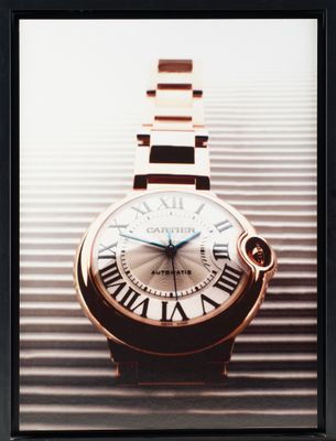 a picture of a watch with roman numerals on it