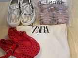 two pairs of shoes, a bag, and a pair of shoes