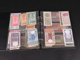 a black binder with a bunch of different bills on it