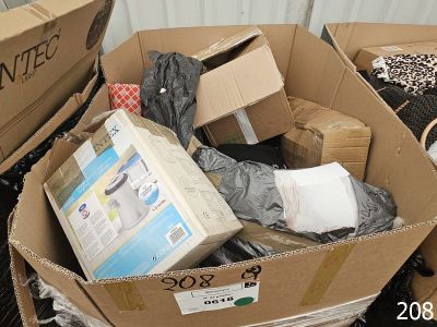 a cardboard box full of boxes and other items on the floor