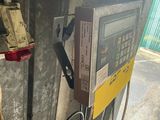 a picture of a machine that is sitting in a garage