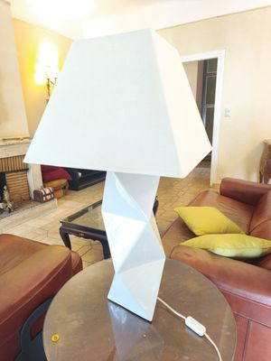 a lamp that is sitting on a table in a living room