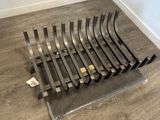 a metal rack that is on the floor in a room