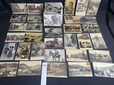 many old postcards of different types and sizes are on a table