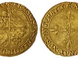 une pièce d'or avec une croix au recto et une croix au verso