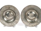 pair of silver plated candlesticks on stands on a white background