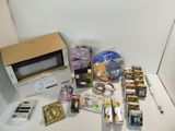 many items that are sitting on a table next to a microwave