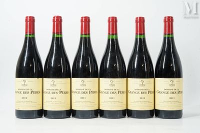 six bottles of red wine are lined up in a row