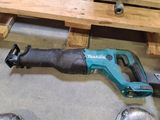 a picture of a corded recip saw on the floor