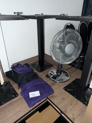 a fan that is sitting on top of a desk