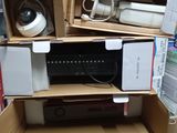 many boxes stacked on top of each other in a store