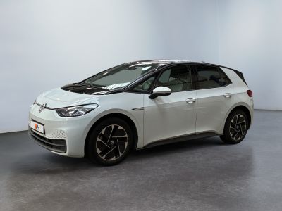 a white toyota c - hr is parked in a white room