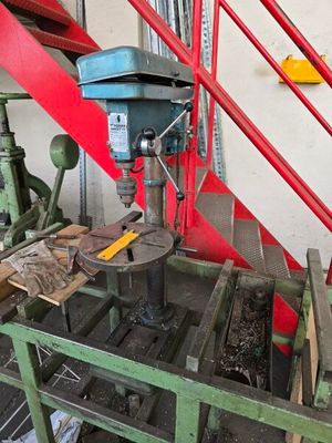a machine that is working on a piece of wood