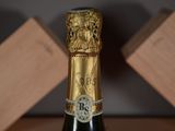 a bottle of wine that is sitting on a table