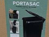 a box with a picture of a black trash can inside of it