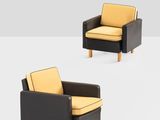 two black and yellow chairs with yellow cushions on a white surface