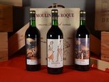 three bottles of wine sitting next to each other on a table