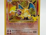 a close up of a pokemon card on a white surface