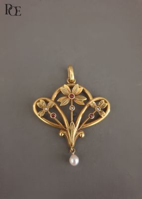 Pendentif en or jaune 18k (750‰) à décor de trois fleurs épa… - Photo 1