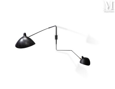 an image of a wall lamp with a black shade on a white background