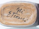 a close up of a stone with writing on it