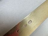 a knife that has been cut in half on the table