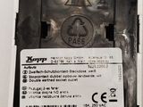 a close up of a cell phone with a sticker on it