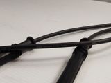 two black wires that are connected to each other on a table