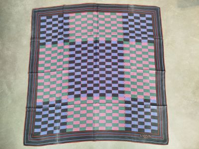an image of a checkered blanket laying on the floor