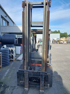 a forklift that is parked in a parking lot