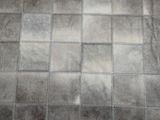 an image of a rug with a checkered pattern on it