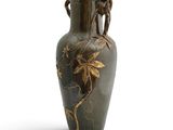 a vase with a design on it on a white background