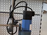 an image of a metal object with wires attached to it