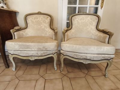 pair of antique french style chairs with upholstered arms