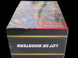 a box of pokemon cards sitting on a black surface
