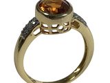 an image of a yellow gold ring with a large citrine stone
