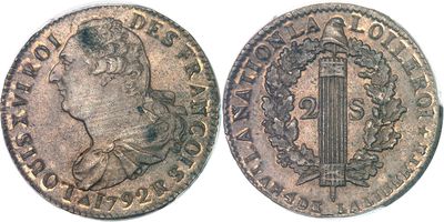gros plan d'une pièce de monnaie sur fond blanc