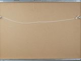 a picture of a piece of cardboard with a string attached to it