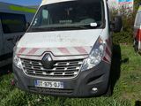 a white van that is parked in the grass