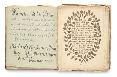 an open book with a picture of a tree on it