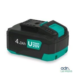 une batterie à laquelle est raccordé un chargeur de batterie