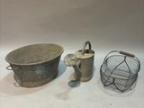 several different types of metal items are displayed on a white surface