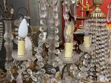 a lot of crystal chandeliers that are on the table